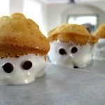 stems-with-eyes Dip the bottoms of the cupcakes in melted confectioners coating, aka Almond Bark