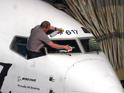Guy cleaning the jets windshield - something I do not see every day! Guy cleaning the jets windshield - something I do not see every day!