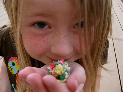 Mary holding a pile of firework fluff